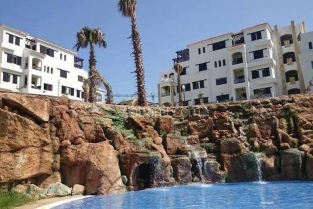 Appartement de 103m2 dans complexe balnéaire Lilac's garden Cabo Negro Esterno foto